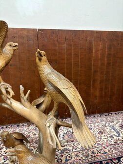 Antiek houtsnijwerk van diverse vogels