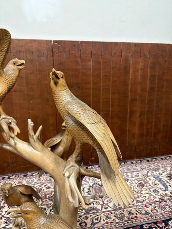 Antiek houtsnijwerk van diverse vogels