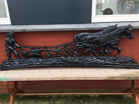 Ornament ploegende boer met paard
