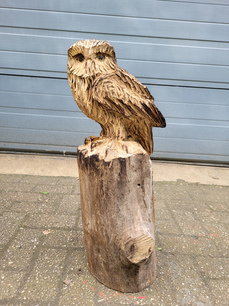 Klein houtsnijwerk van een Uil