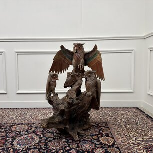 Antique wood carving of various Owls