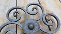 Round wrought iron ornament with curls and flower - OS43