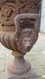Cast iron garden vase with lion heads