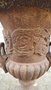 Cast iron garden vase with lion heads
