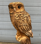 Large carving of an Owl, Squirrel and Fox