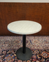 Round bistro table with marble look top