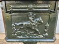 Antique cast iron English letterbox on a leg Green
