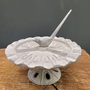 Cast iron bowl with Bird sundial