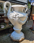 Large antique cast iron vase with swans