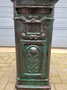 Antique cast iron freestanding mailbox