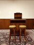 Antique English Chesterfield mahogany bar with bar stools