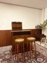 Antique English Chesterfield mahogany bar with bar stools