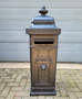 Old cast iron freestanding mailbox