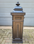 Old cast iron freestanding mailbox