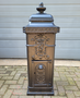 Old cast iron freestanding mailbox