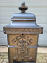 Old cast iron freestanding mailbox